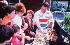 Family at a barbecue; Actual size=240 pixels wide